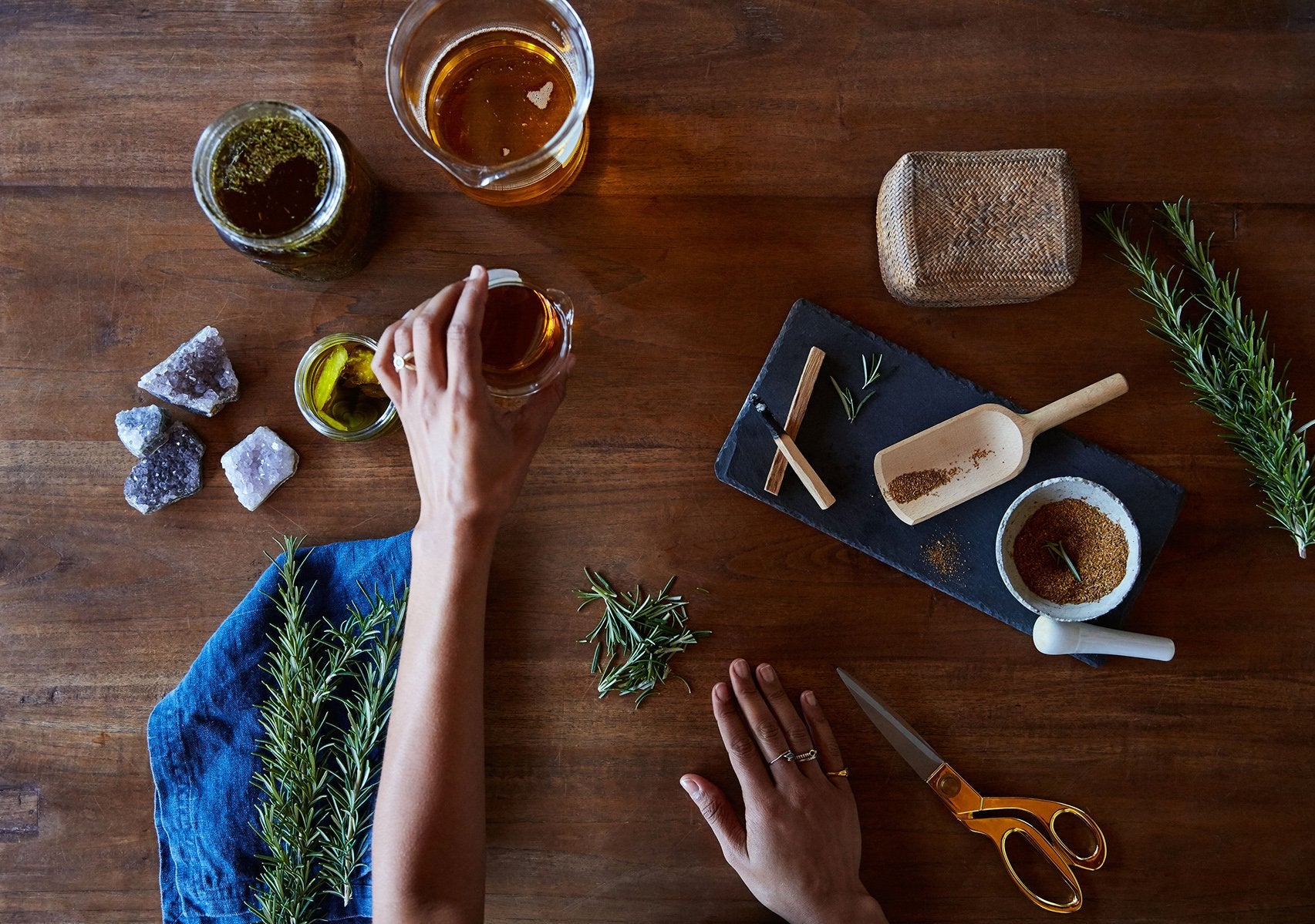 Woman making organic skincare products in her studio
